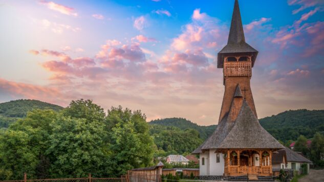 Wooden church in suburb at sunset