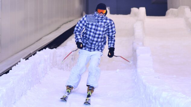 man on indoor ski slope