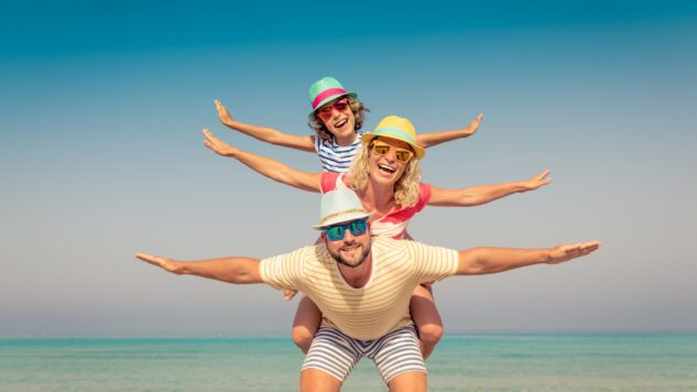 family on beach happy