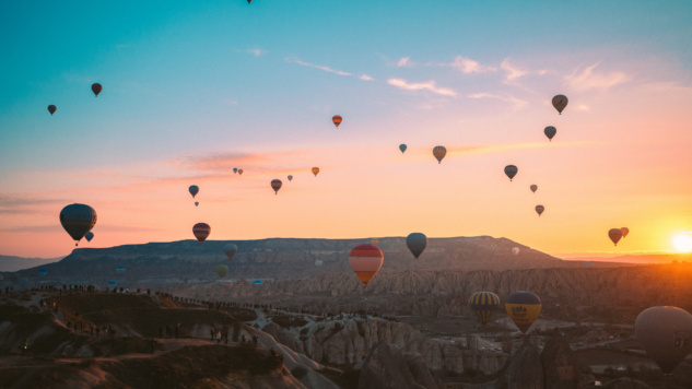 Image of Hot Air Balloons Flying over the Mountains in Turkey